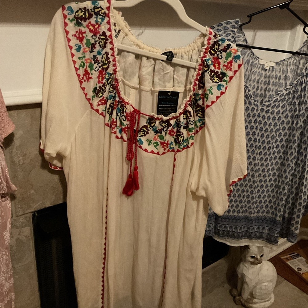 3 tops.  One New with tag. Plus 3 XL